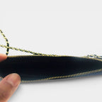 SIGNATURE CROSSBODY POUCH